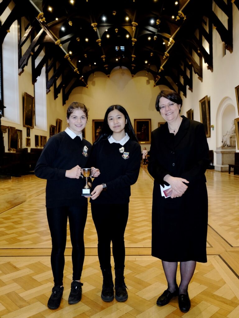 The winners of the Novice Final, Juliet M and Annabel L from Currie Community High School, with Lady Hale. 