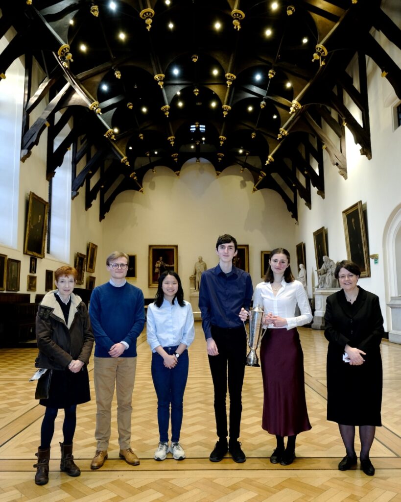 Ruth Crawford, Treasurer at the Faculty of Advocates; Logan M and Natalie Y, the runners-up from Dollar Academy; Luke R and Emma C, the winners from Broxburn Academy; and Lady Hale.